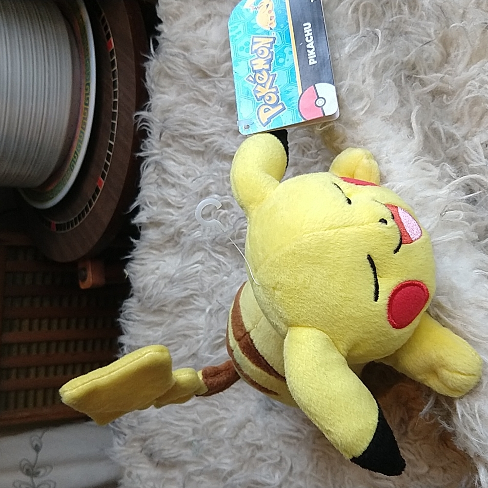 Pokemon Pikachu Laying Down Smiling Eyes Closed Plush Tomy